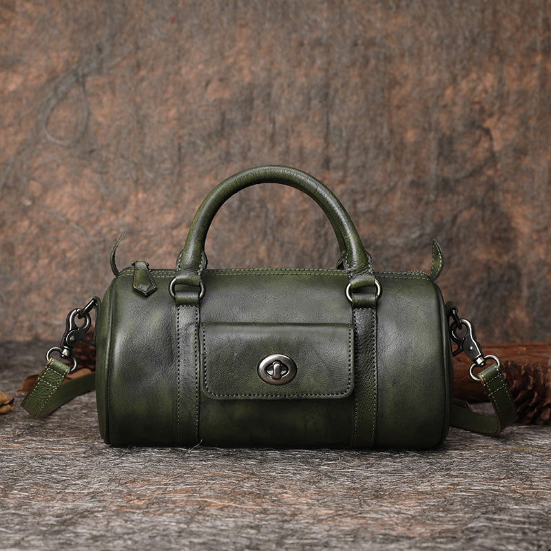 Walnut pueblo barrel bag with antique copper hardware. Pattern from  LeatherDIYStudio. : r/Leathercraft